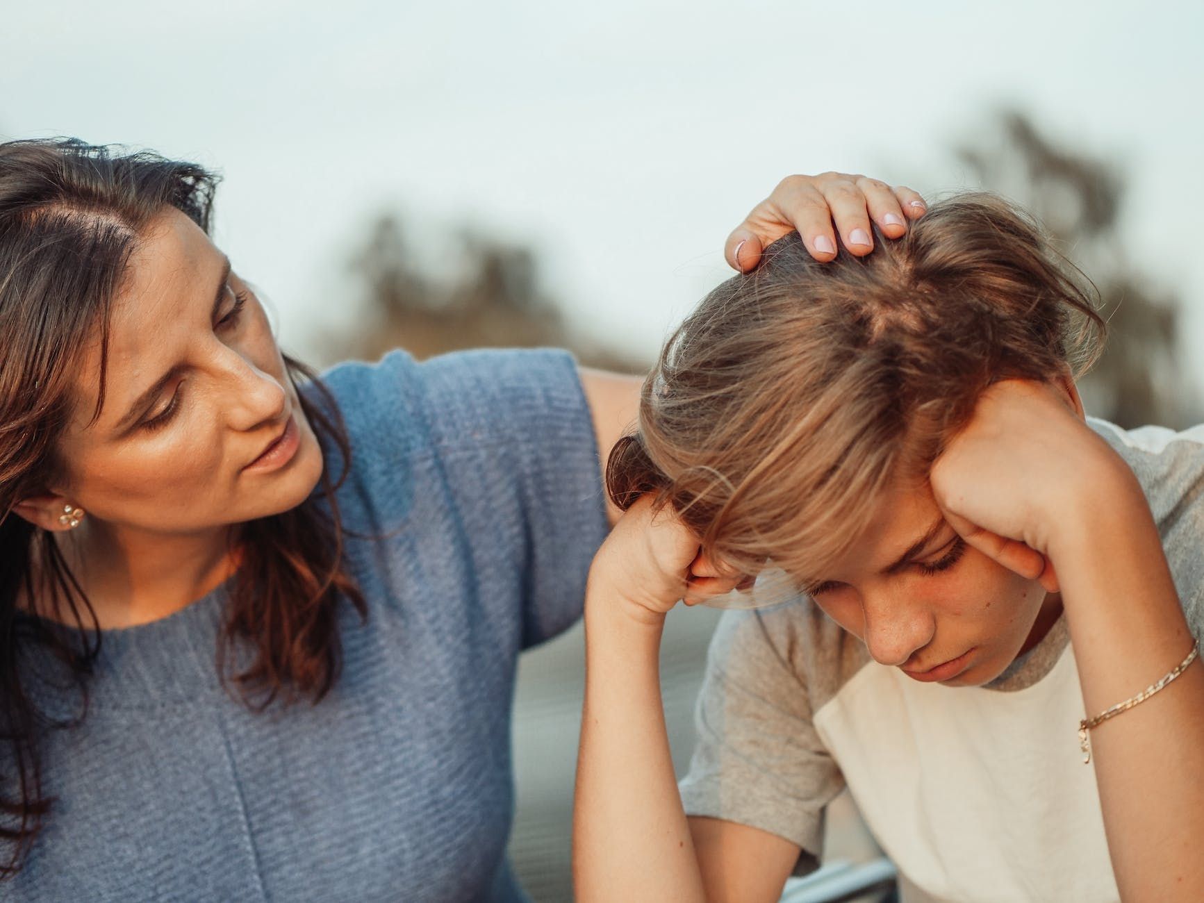 woman in blue shirt talking to a young man in white shirt woman in blue shirt talking to a young man in white shirt woman in blue shirt talking to a young man in white shirt woman in blue shirt talking to a young man in white shirt woman in blue shirt talking to a young man in white shirt